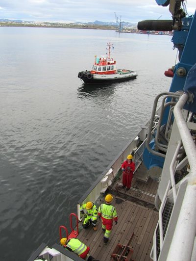 RRS Discovery accompanied out of Grafarvogur Fjord by the pilot boat.